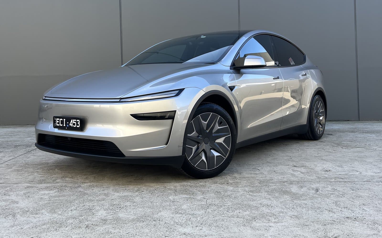 Silver Tesla Model Y after a mini detail