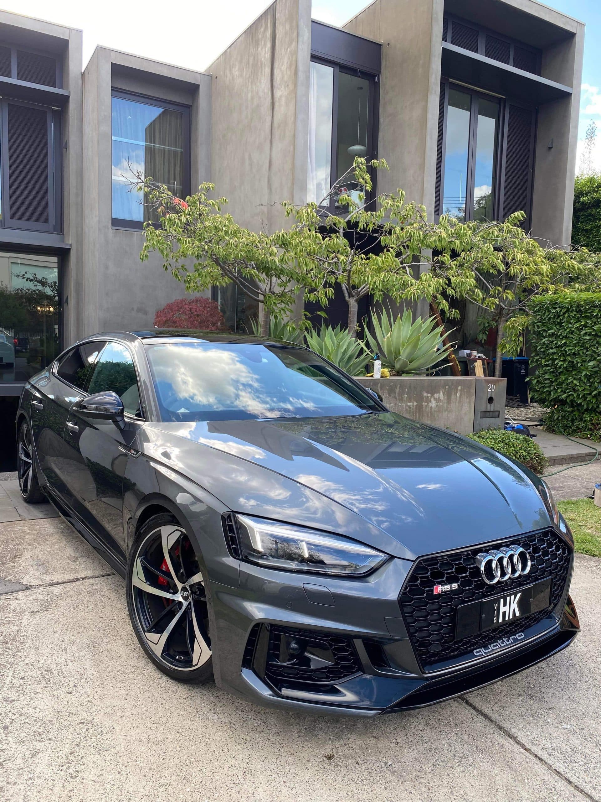 Audi RS5 after a mobile detail on a driveway