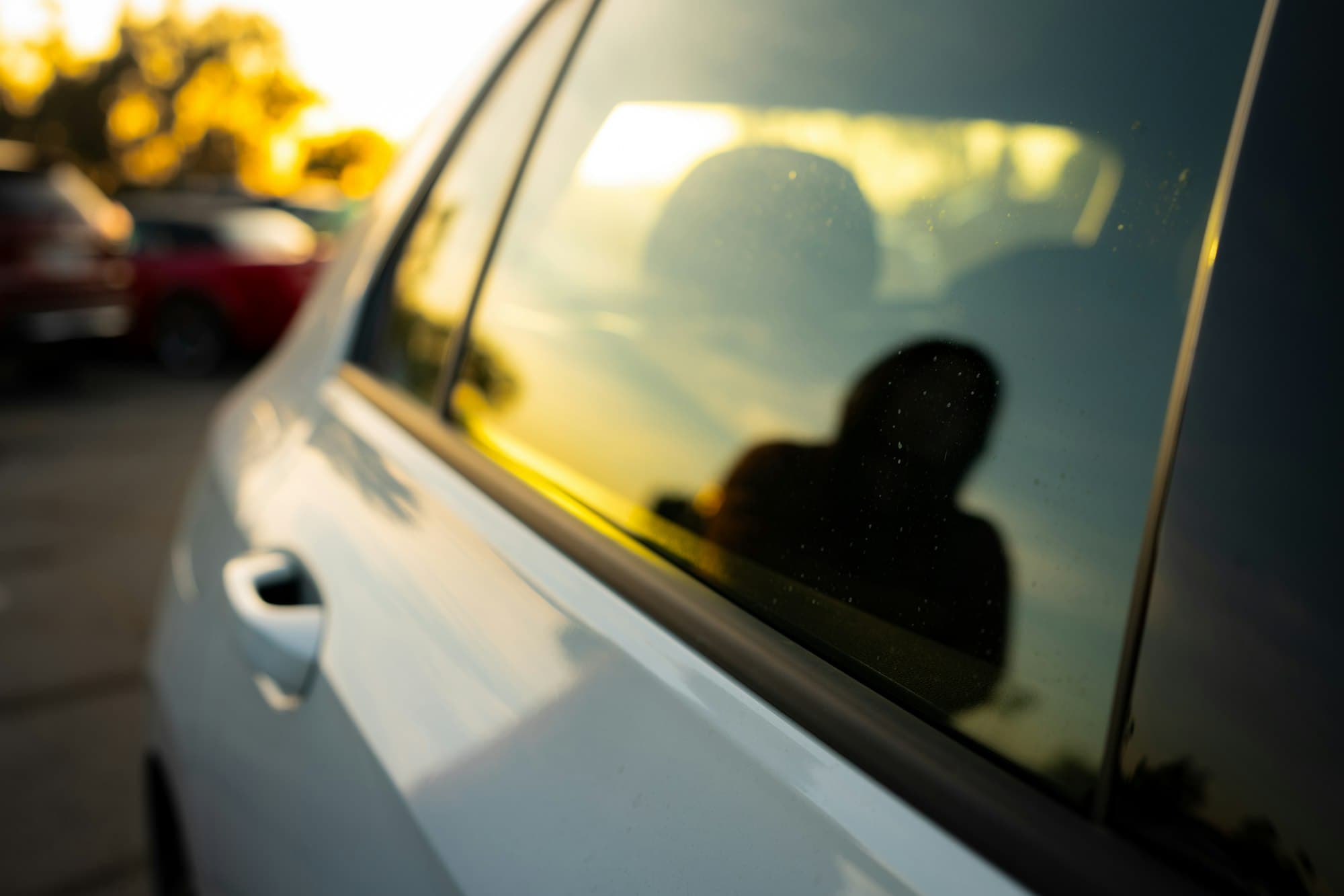 Sun reflecting off a car side window