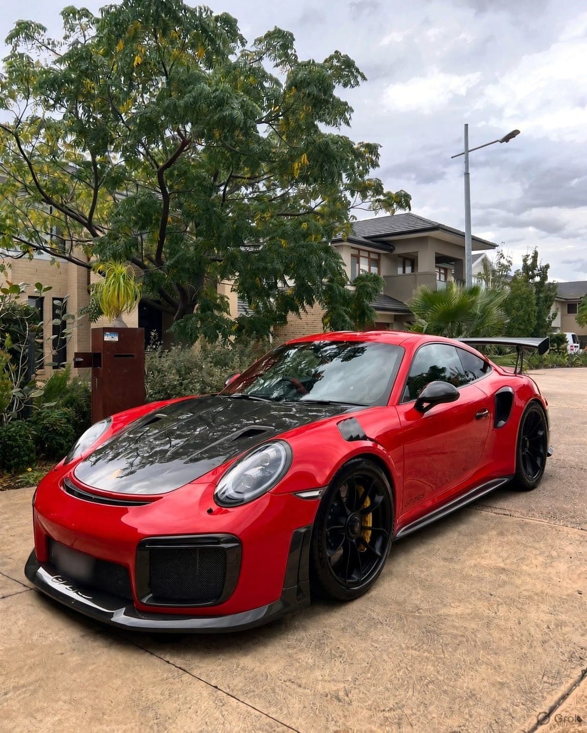 Red Porsche 911 GT2 RS after a full interior and exterior detail