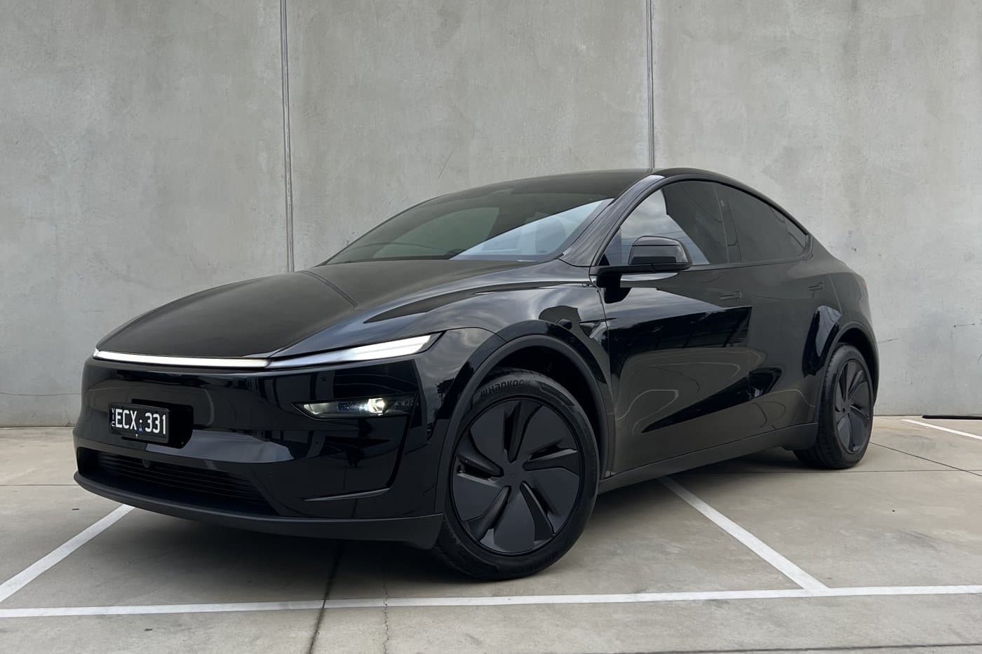 Black Tesla Model Y with tinted windows