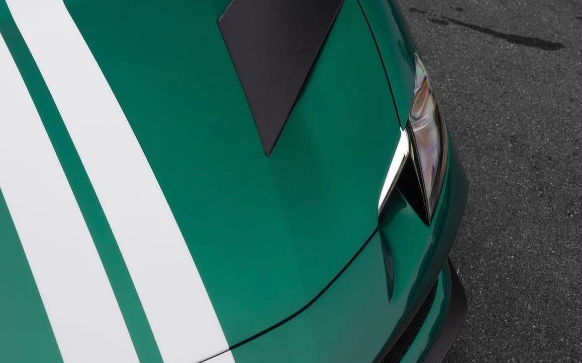 Green Ferrari bonnet after a Diamond exterior ceramic coating