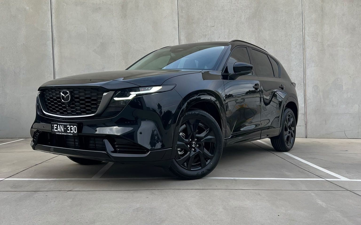 Black Mazda CX-60 after a Diamond interior and exterior detail