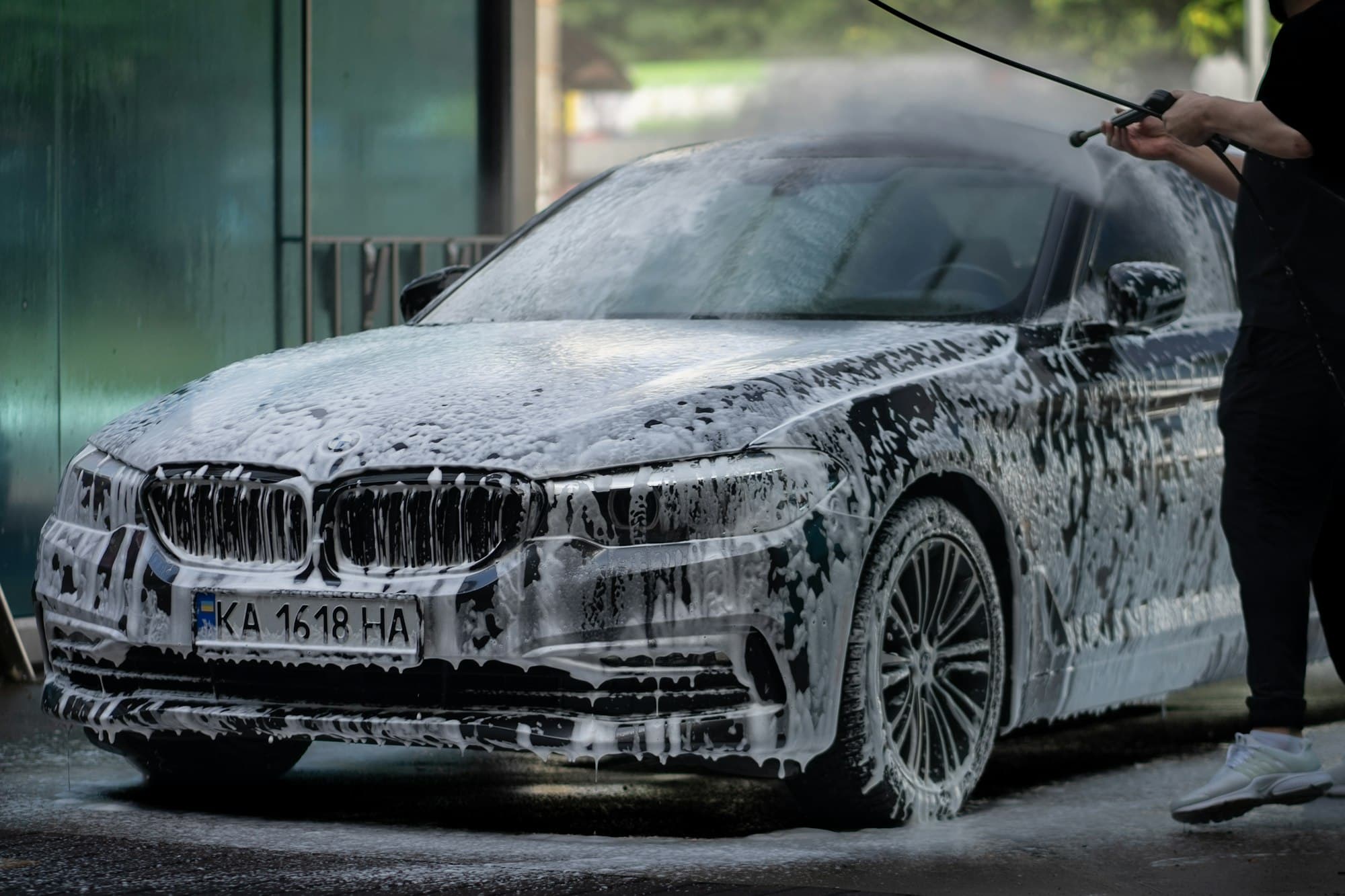BMW covered in snow foam during a hand wash