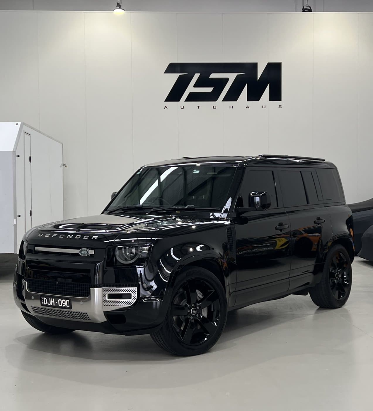 Black Land Rover Defender at the Team Soutar Motorsport garage