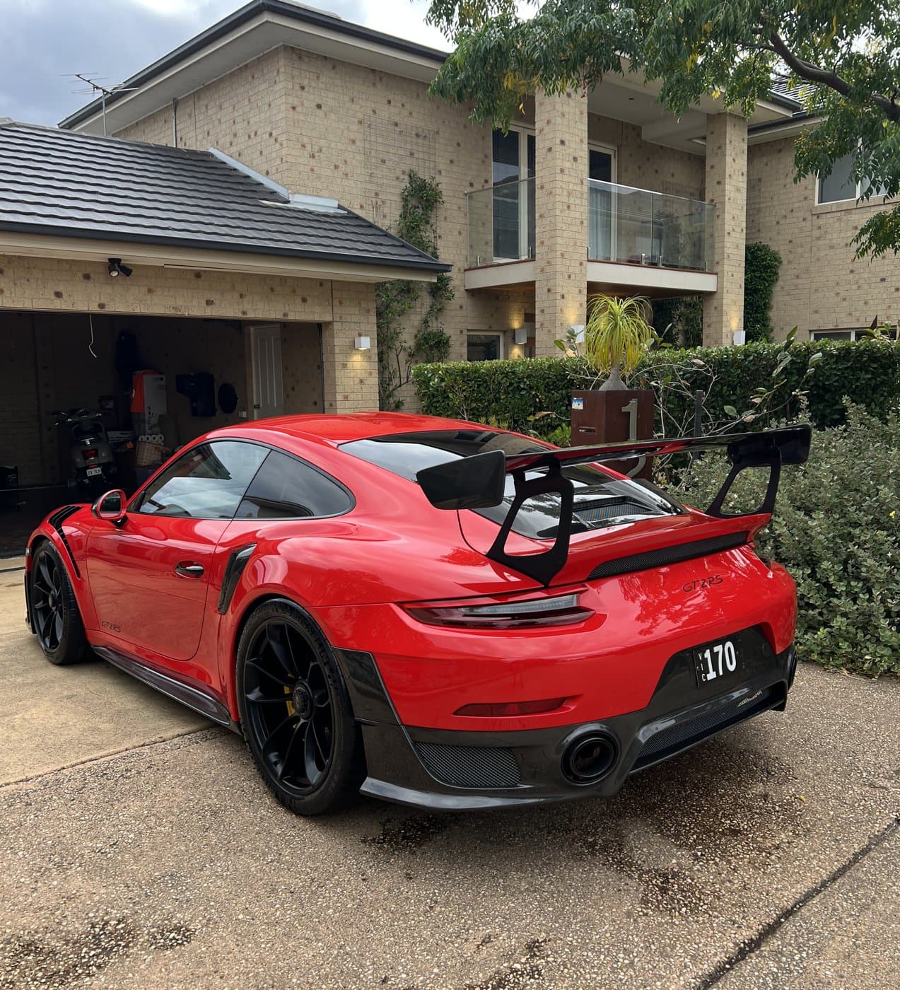 Red Porsche 911 GT2 RS after a full detail