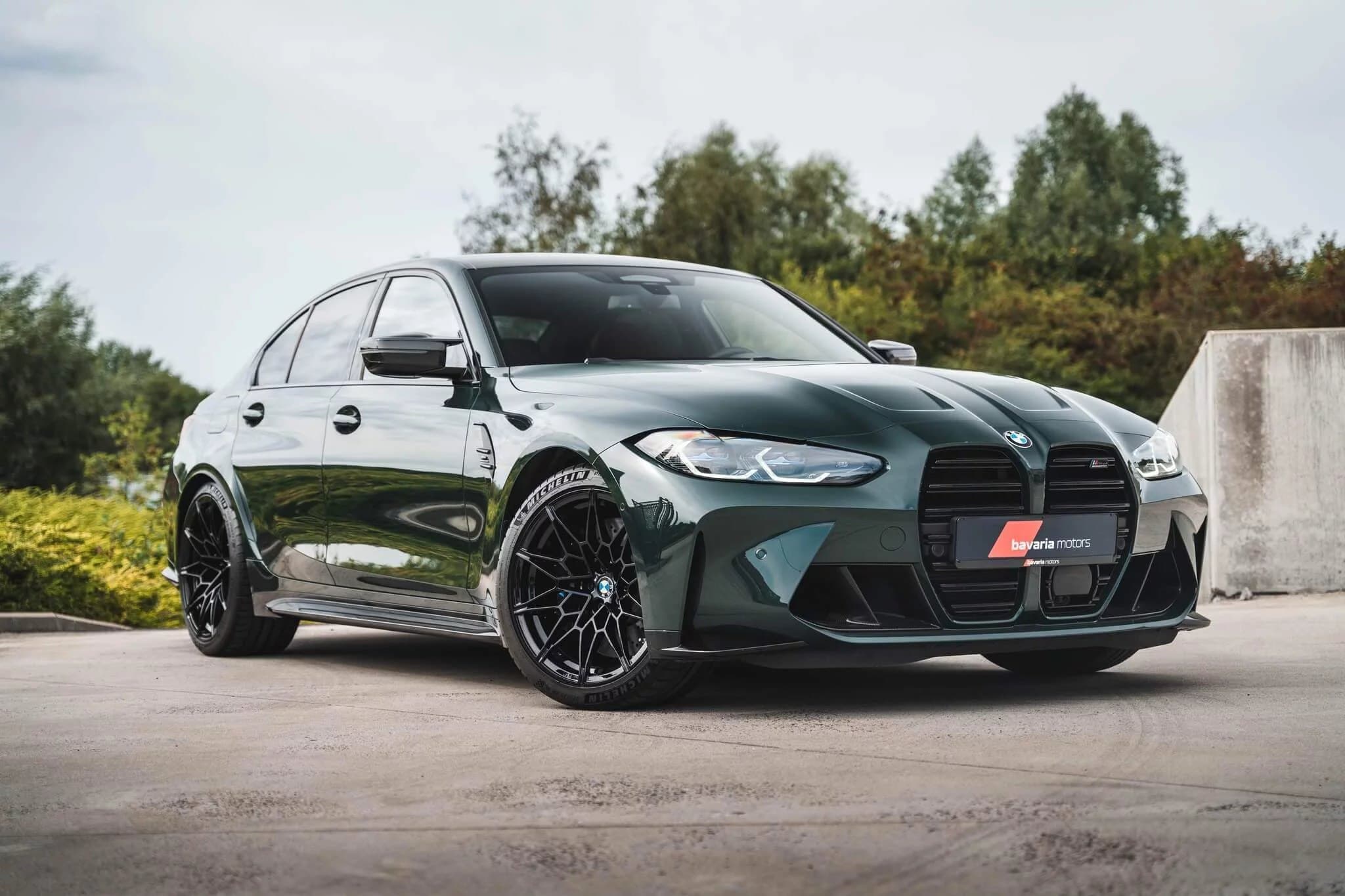 Dark green BMW M3 with a freshly detailed finish